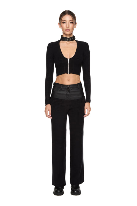Knitted pants and jumper with vegan leather