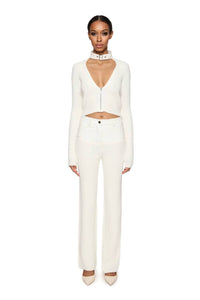 Knitted pants with vegan leather choker