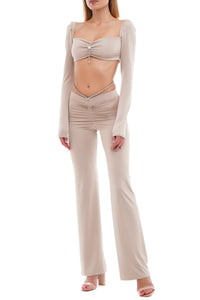 Stretch pants with crystal belt